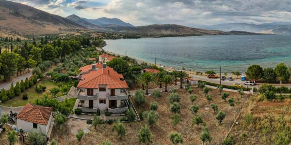 KRISSAIA SEASIDE SUITES, Брондау  Central Greece қаласындағы төсек алаңы бар қонақ үйлер, Тоқтау алаңы
